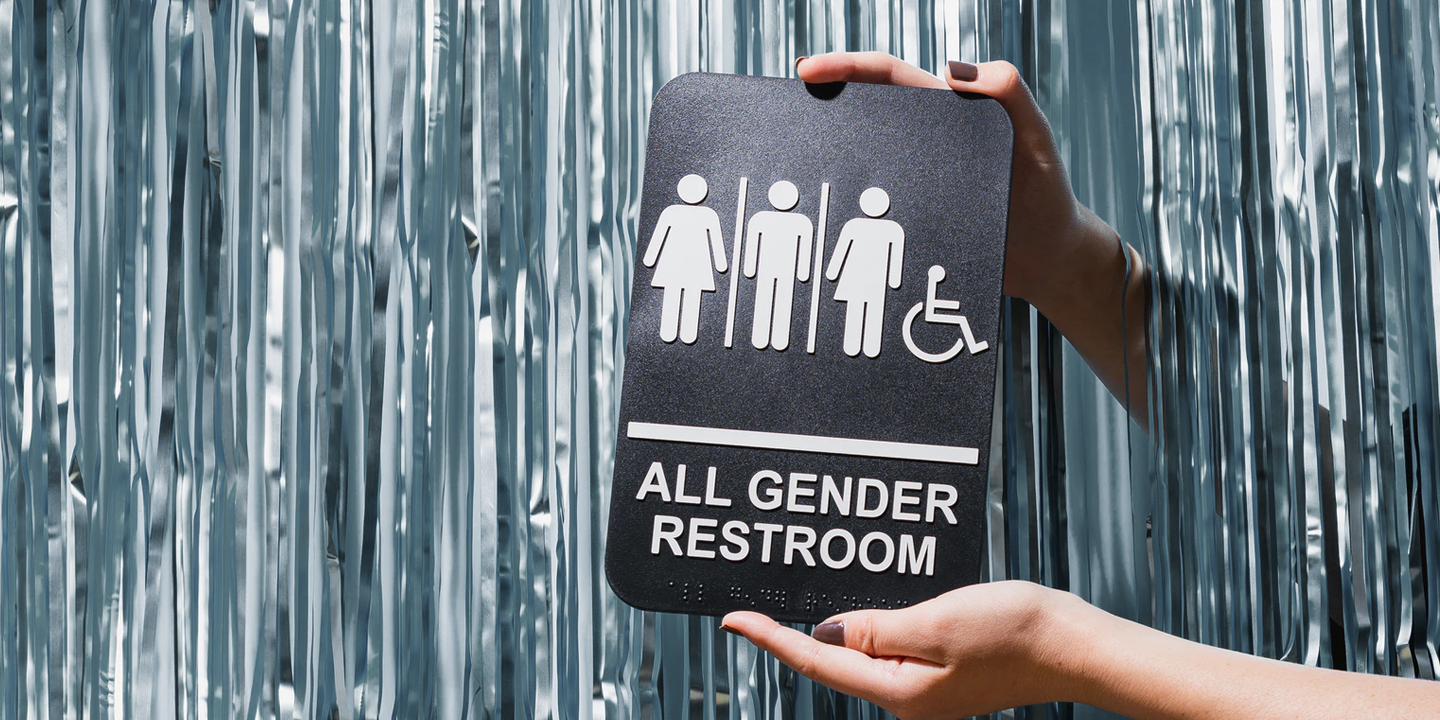All gender washroom sign